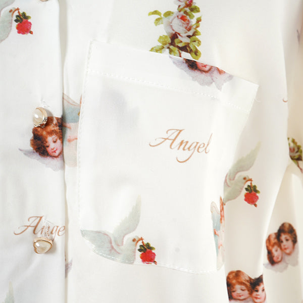 Twin angels' white shirt