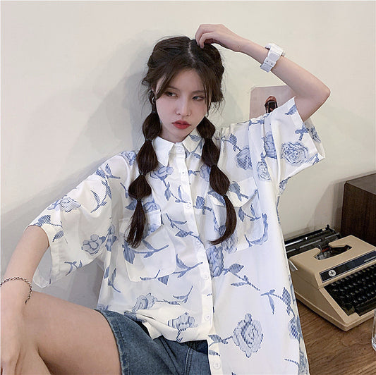 ストライプローズの半袖フラップポケットシャツ