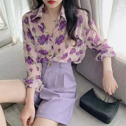 Purple flowers, on pink