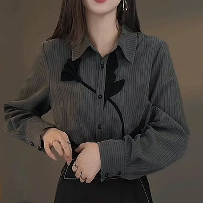 A single flower, pinstripes