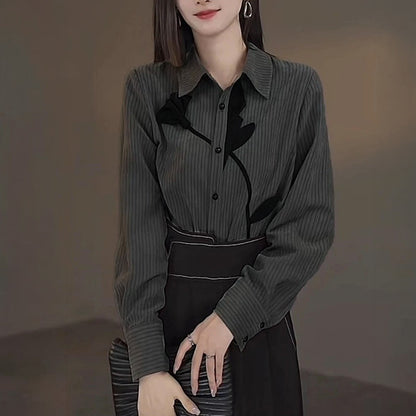 A single flower, pinstripes