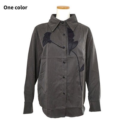 A single flower, pinstripes