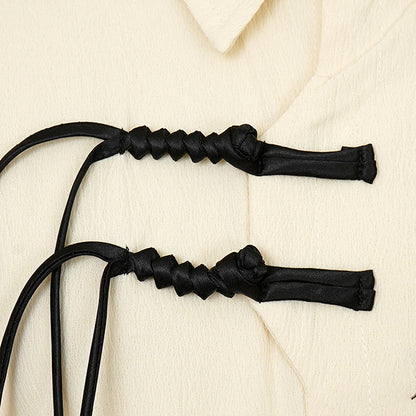 Knot and bamboo leaves