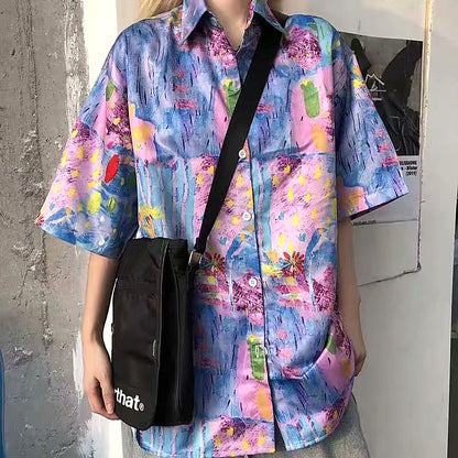 ファンシーカラーの油絵チックな花柄半袖シャツ