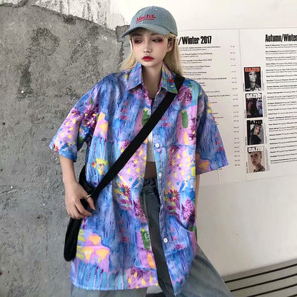ファンシーカラーの油絵チックな花柄半袖シャツ