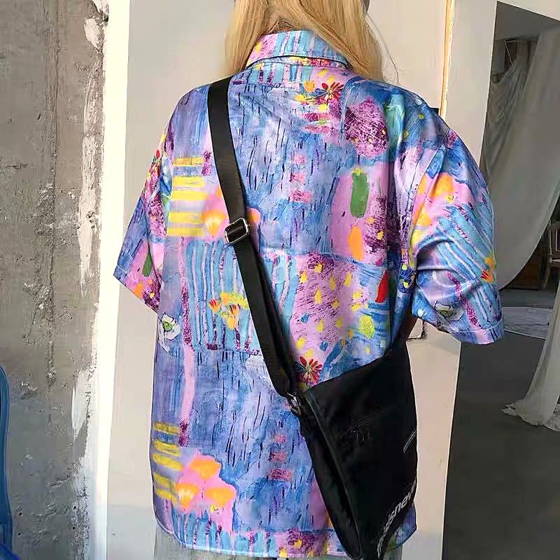 ファンシーカラーの油絵チックな花柄半袖シャツ